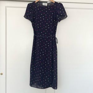 Vintage navy blue wrap dress. Flower detail.